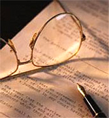 Legal document with glasses and ink pen